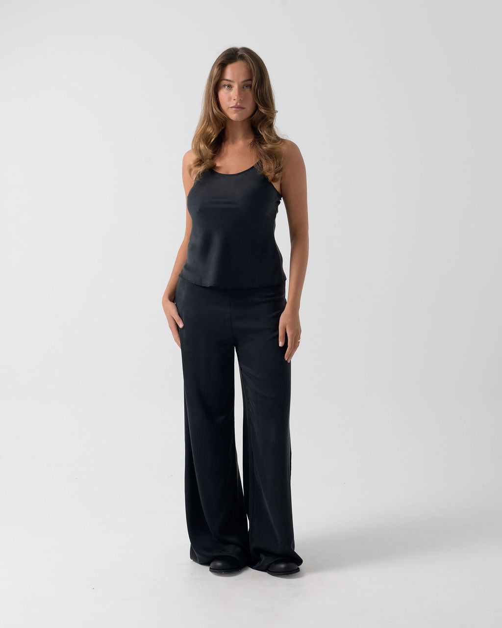 Front view of the Washed Black Camisole featuring a classic 90s-inspired silhouette in stonewashed stretch silk.