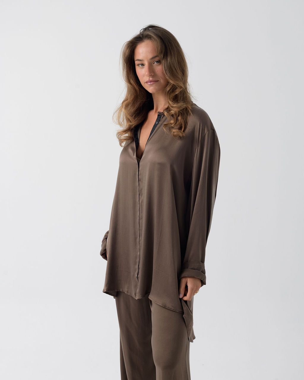 three-quarter-view.jpg
Model wearing the Hazelnut Oversized Silk Shirt in stretch silk with a relaxed oversized fit.