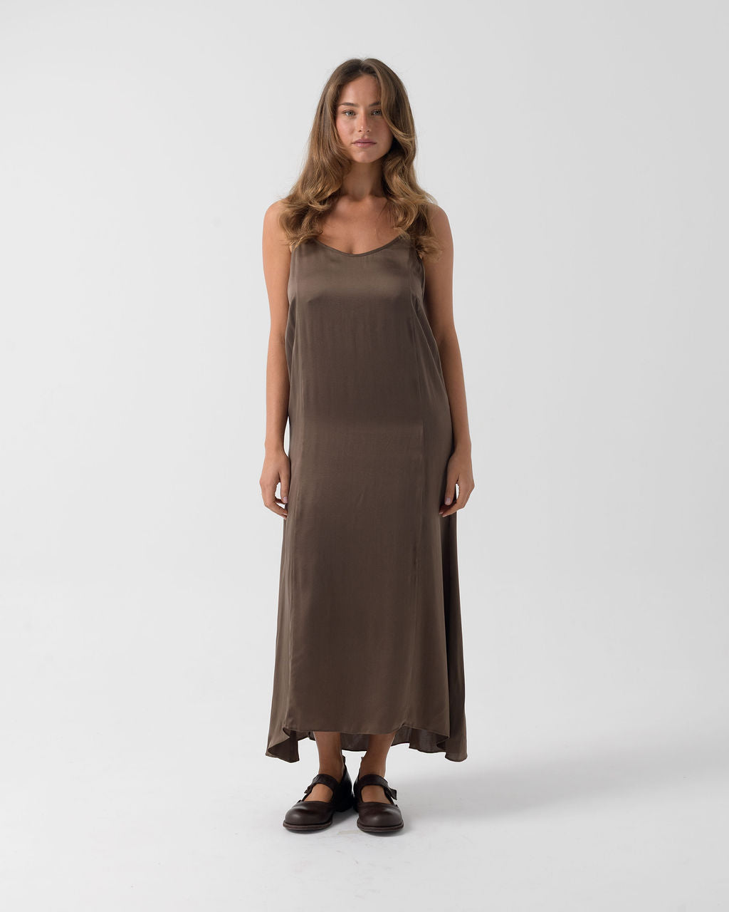 Front view of the Moka Signature Slip Dress in stonewashed stretch silk, featuring a fluid silhouette, adjustable straps and an elegant full-length drape.