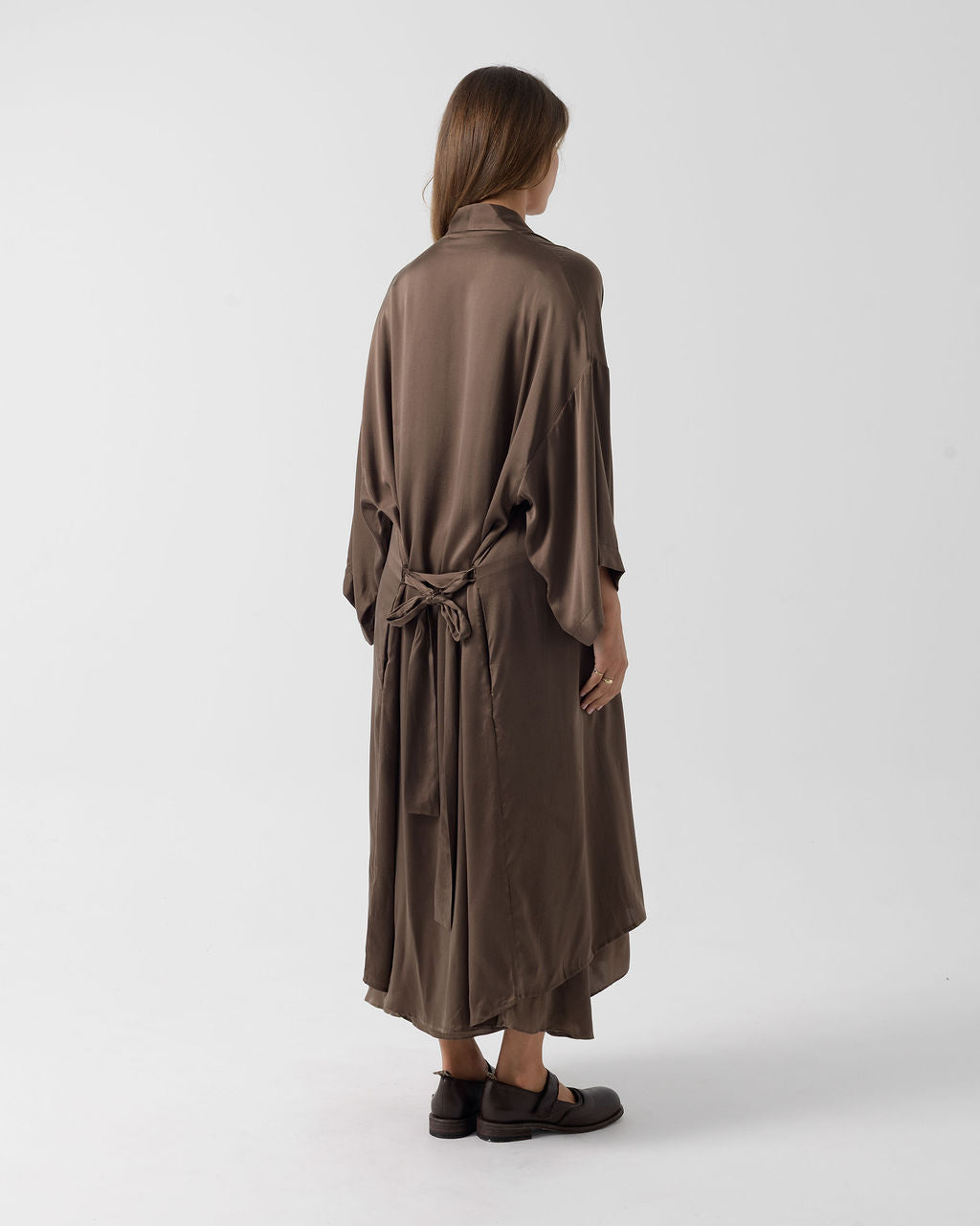 Back view of the Moka Stretched Silk Robe featuring the adjustable waist tie, relaxed silhouette and flowing silk drape.
